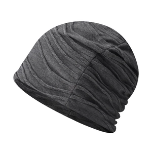 Detailed view of dark grey slouchy beanie featuring natural horizontal ribbed textures