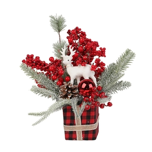 Artificial Christmas pine branch arrangement with red berries and white deer in festive box