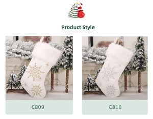 Detail of white velvet Christmas stockings with embroidered snowflakes and faux fur trim