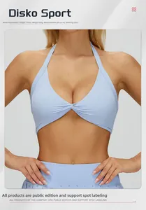 Detail of light blue halter yoga bra featuring a stylish front twist and ribbed fabric texture