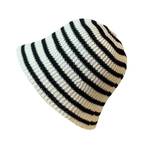 Women's 2025 knitted bucket hat featuring black and white horizontal stripes in crochet style