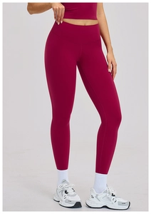 Close-up of wine red high waist yoga leggings with elastic matte seamless fabric