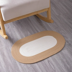 Japanese style hand-woven oval cotton rug in beige and white for bedroom or bathroom