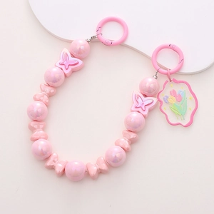 Chaîne de téléphone en perles roses avec pendentif tulipe en acrylique et charms papillons