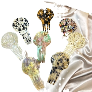Elegant acetate leopard print hair combs for women in various stylish colors and patterns