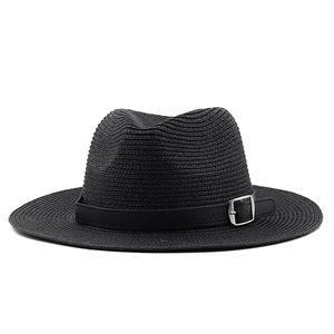 Close-up of black straw fedora with a leather band and silver metal buckle detail