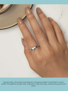 Close-up of S925 sterling silver puppy ring featuring realistic golden retriever texture