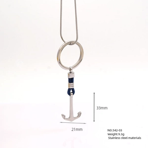 Detail of silver stainless steel anchor pendant with blue knot detail, 33mm by 21mm