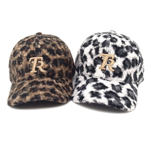 Brown and white leopard print faux fur baseball caps featuring golden R sequin embroidery