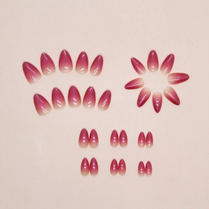 Glossy almond shaped ombre fake nails set in gradient magenta and nude pink tones