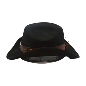 Detail of black felt cowboy hat with leather band featuring a metal bull head ornament