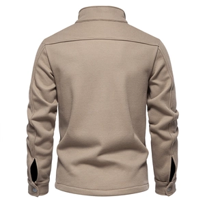 Back view of khaki waffle knit jacket with textured fabric and structured collar design