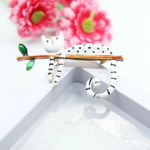Cute lazy white cat with black spots on a tree branch enamel brooch fashion jewelry