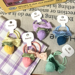 Five-pack cute fabric strawberry bow hair scrunchies in vibrant pastel colors for girls