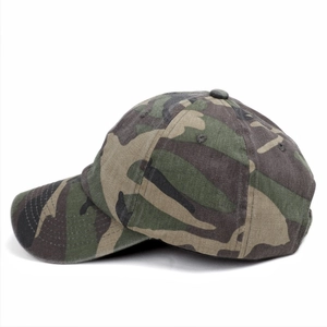 Detailed view of woodland camouflage baseball cap featuring durable cotton canvas stitching