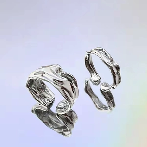 Irregular liquid metal texture silver open rings with minimalist molten lava aesthetic
