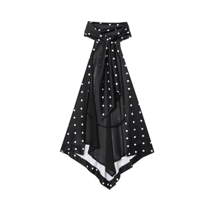 Vintage black and white polka dot sleeveless wrap top for women on white background