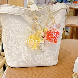 Llaveros de tortuga luminosos con lentejuelas de cerezo y cierre dorado para bolsos
