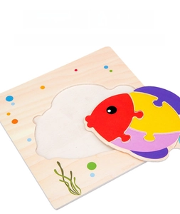 Close-up of colorful wooden fish puzzle showing smooth edges and child-friendly pieces