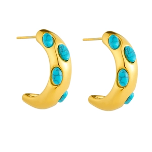 Gold C-shape earrings with inlaid blue turquoise stones on a white background