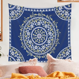 Detailed view of bohemian mandala wall tapestry with blue, white and yellow patterns