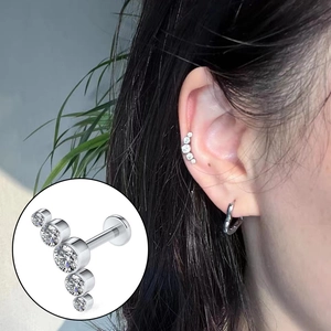Surgical steel curved bar stud with five round white cubic zirconia stones in flat back style