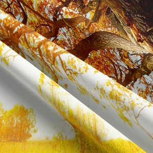 Macro shot of forest tapestry fabric showing autumn tree print and soft textile texture