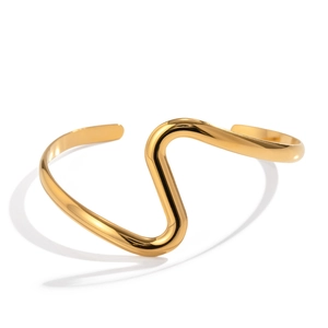 Minimalist 18K gold plated stainless steel wave bangle with a polished mirror finish