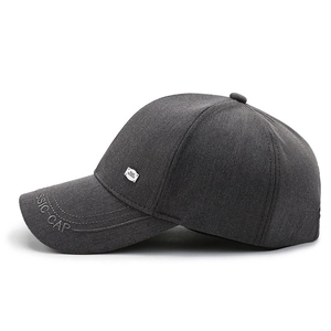 Dark grey baseball cap with Classic Cap embroidery and a subtle metal logo pin