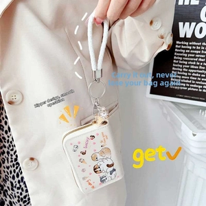 Detail of cute cat print wallet with zipper and woven wrist strap for women