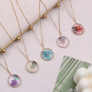 Bohemian butterfly necklaces with real dried flowers in glass pendants, six color options