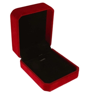 Detail of red velvet jewelry box with black inner cushion and durable metal hinges