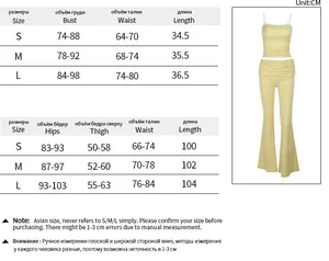 Tabella taglie dettagliata per set top in pizzo e pantaloni a zampa in cm