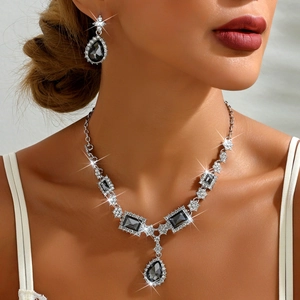 Elegant silver jewelry set with square black crystal necklace and teardrop earrings