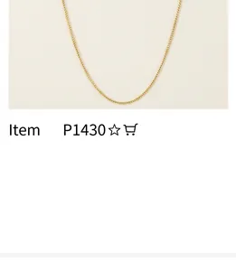 Close-up of a delicate irregular gold chain necklace texture with minimalist metal style