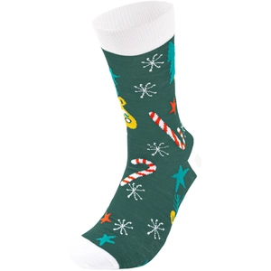 Detailed close-up of dark green Christmas socks with colorful festive holiday patterns