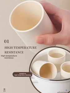 Macro detail of heat-resistant cream white cups being sterilized in boiling water