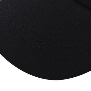 Close-up of black cotton baseball cap brim with precise four-row stitching detail