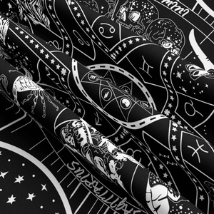 Close-up of astrological tapestry showing Sagittarius print and soft fabric texture
