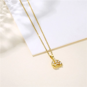 Elegant gold heart pendant necklace with clear zircon inlay on a delicate chain