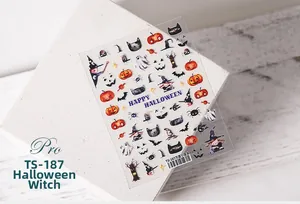Macro detail of TS-187 Halloween nail stickers with witch and pumpkin illustrations
