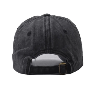 Detail view of the washed denim baseball cap back featuring an adjustable metal buckle