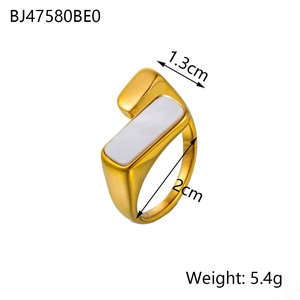 Detail view of gold titanium steel ring with rectangular white shell inlay and measurements