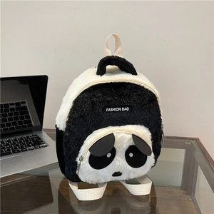 Detail view of plush panda backpack showing high-quality faux fur texture and fabric straps