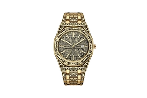 Detail view of golden octagonal watch with intricate Arabic calligraphy and metal strap