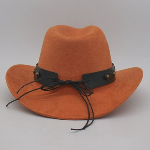 Detail of camel brown western cowboy hat with studded black leather belt and tassels