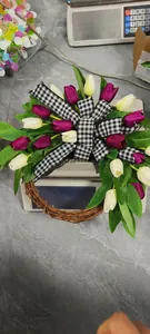 Detailed view of artificial tulip wreath showing 0.170kg weight on a digital scale