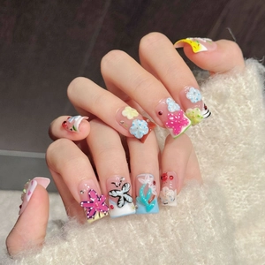 3D floral and butterfly handmade press-on nails with cute ladybug accents on long coffin shape