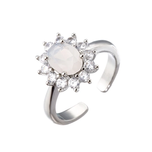 Detail of white oval opal halo ring with cubic zirconia accents and adjustable band