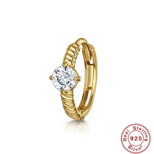 Detail view of gold S925 sterling silver twisted rope earring with white zircon